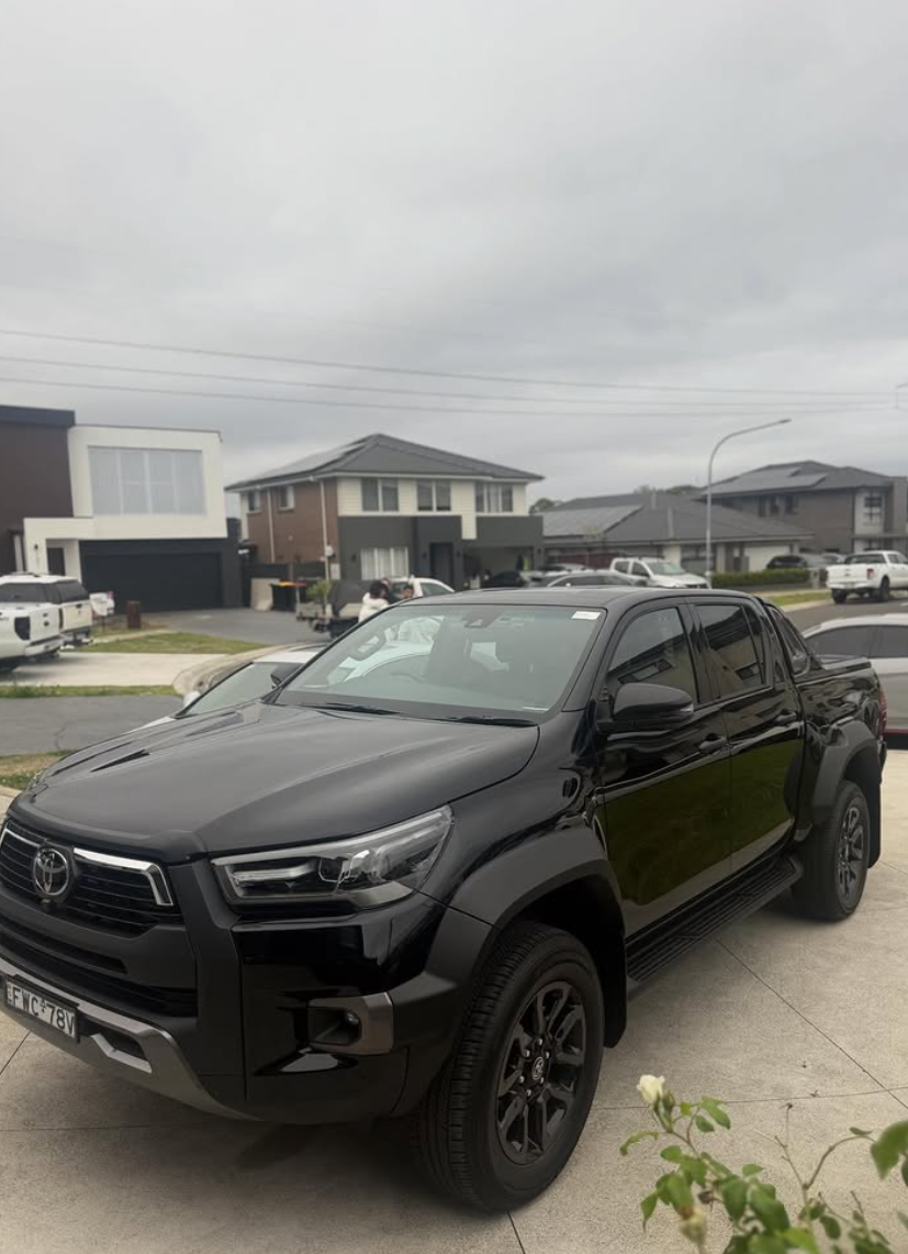 Black Hilux Rogue after detail